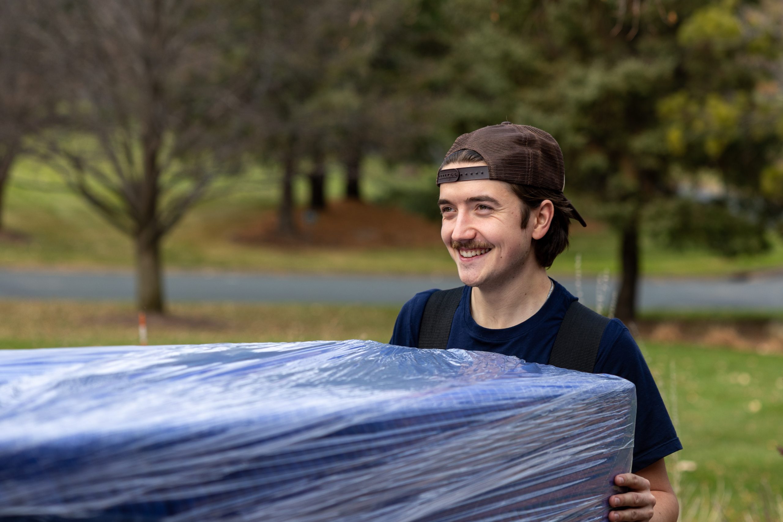Win-Win mover carrying wrapped furniture