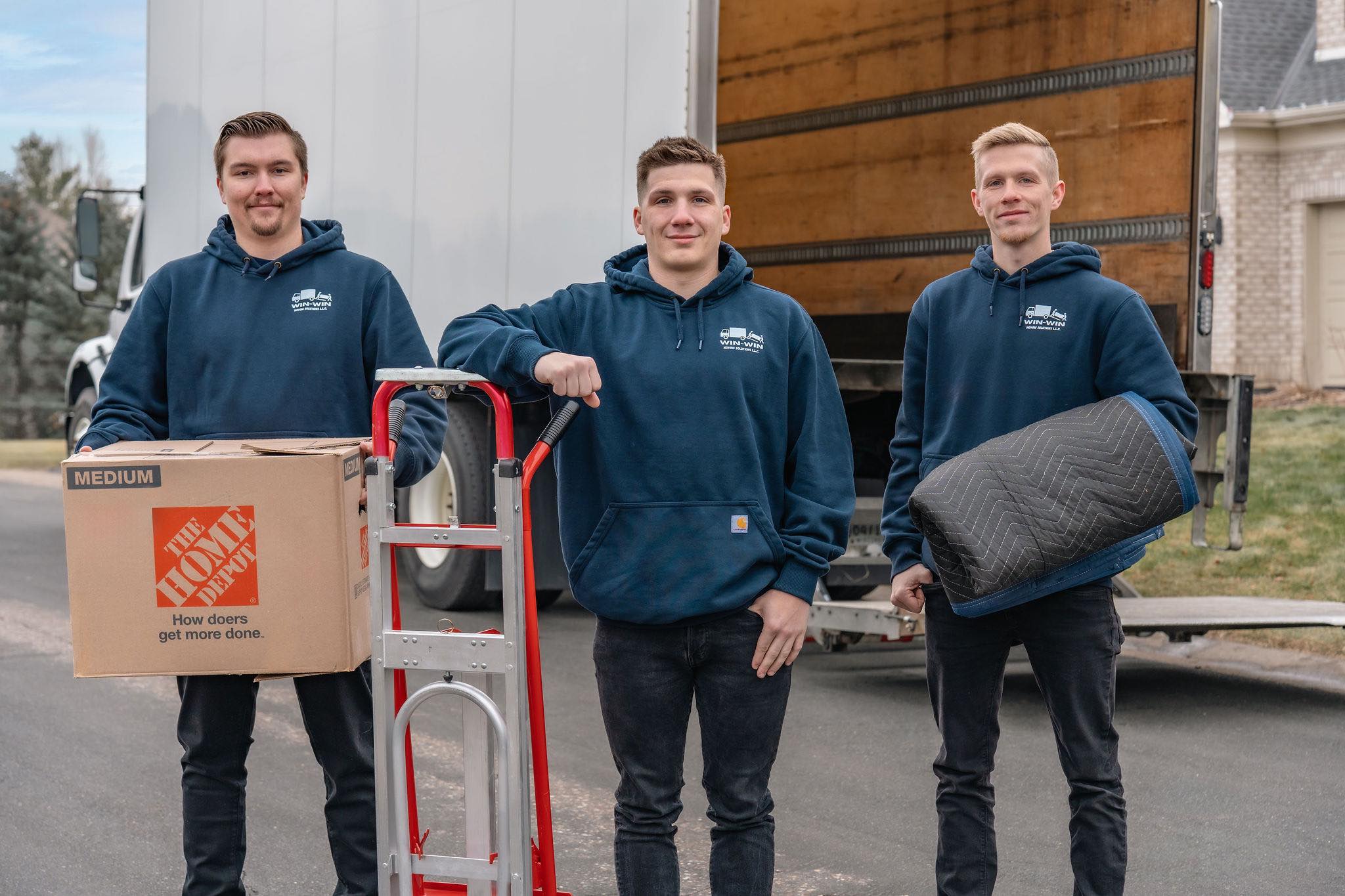 Cody, Carter, and Justin with the Win-Win Moving Solutions truck
